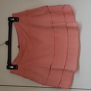 Athleta orange/coral and white pin striped skorts